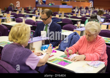 Mecca Bingo UK bingo company. People playing Bingo at Camden Town Bingo Hall, London, UK. Stock Photo