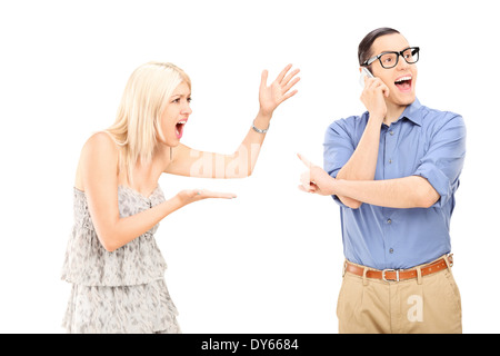 Angry woman yelling at her boyfriend Stock Photo