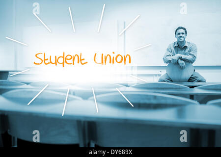Student union against lecturer sitting in lecture hall Stock Photo