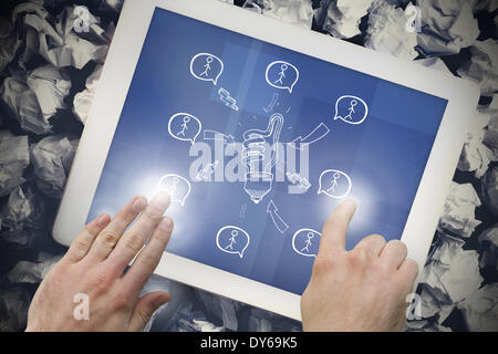 Composite image of hand touching tablet Stock Photo