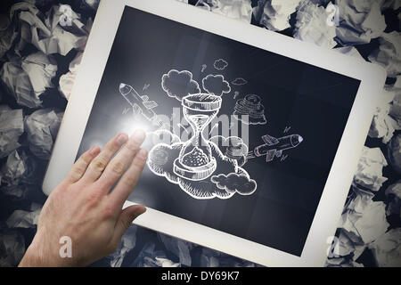 Composite image of hand touching tablet Stock Photo