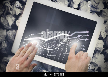 Composite image of hand touching tablet Stock Photo