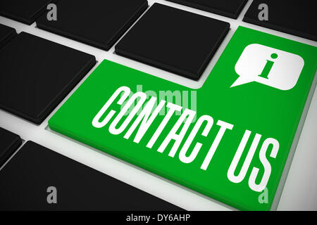Contact us on black keyboard with green key Stock Photo