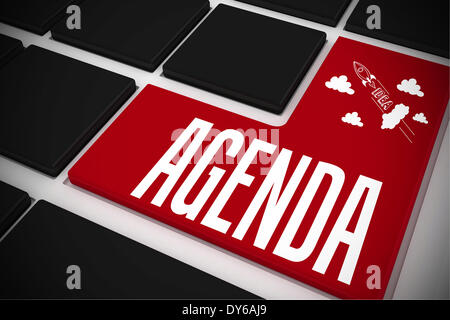 Agenda on black keyboard with red key Stock Photo