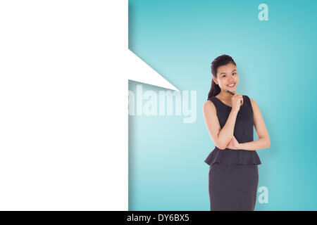 Composite image of thoughtful asian businesswoman with speech bubble Stock Photo