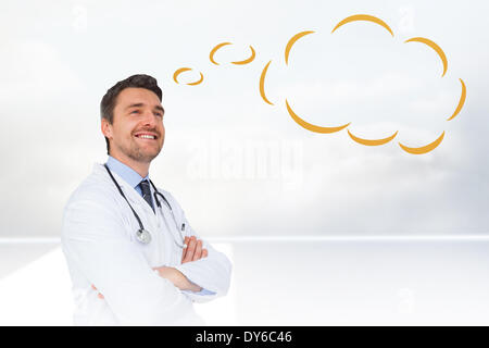 Composite image of handsome young doctor with speech bubble Stock Photo