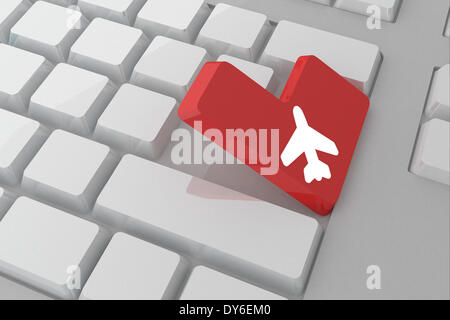 Composite image of airplane on key Stock Photo