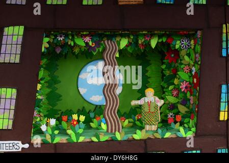 Willy Wonka (Ross Dawes) and Charlie (Troy Tipple) stand for a photocall in  front of a chocolate factory in biscuit form recreated by the West End  musical and Biscuiteers, supported by Tate