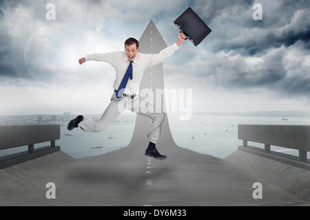 Composite image of cheerful jumping businessman with his suitcase Stock Photo