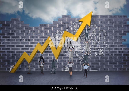 Composite image of business teamwork pushing arrow Stock Photo