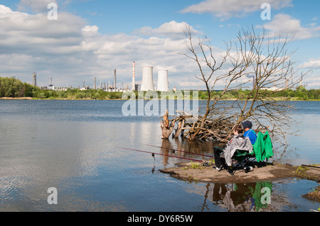 Fishing in Lake at Former Open-cast Mine - Land Rehabilitation and Restoration in Northern Bohemia, Czech Republic Stock Photo