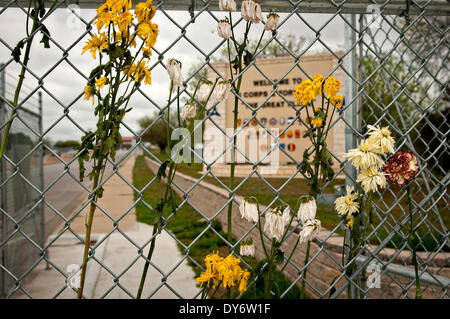 A makeshift memorial of flowers supporting the victims of the April 2 shooting next to the Fort Hood main gate April 7, 2014 in Fort Hood, Texas. Stock Photo