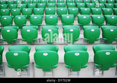 Rows of sport stadium empty seats Stock Photo