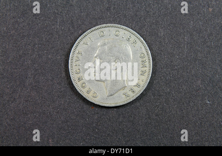 English two shilling coin, issued in 1965, showing King George VI. Stock Photo