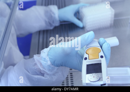 Lab technician takes Pipetting multi-channel, close up Stock Photo