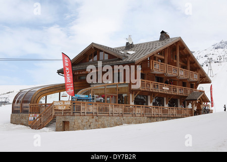 The Le Lac Blanc snack bar in L'Alpe d'Huez, France. The chalet is a self-service restaurant. Stock Photo