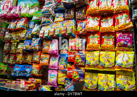 Packets of sweets in a UK supermarket Stock Photo - Alamy