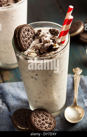 Homemade yogurt in a tall glass on a dark background 