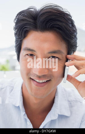 Smiling man on phone call Stock Photo