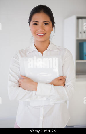 Casual businesswoman smiling at camera Stock Photo