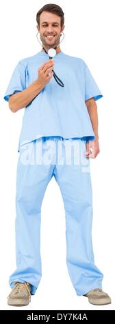Handsome surgeon in blue scrubs using stethoscope Stock Photo