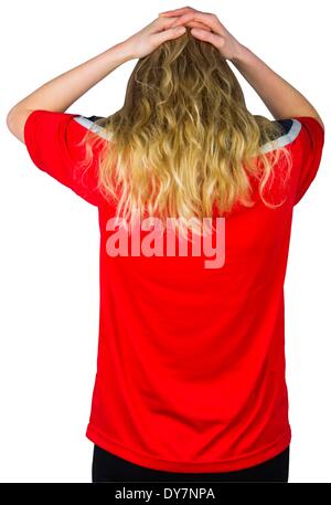 Disappointed football fan in red Stock Photo