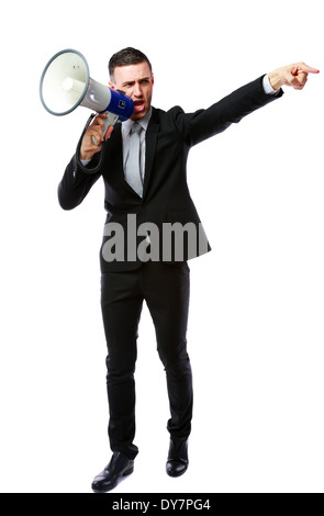 Full length portrait of businessman yelling through megaphone isolated on white background Stock Photo