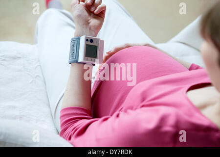 Blood pressure, pregnant woman Stock Photo