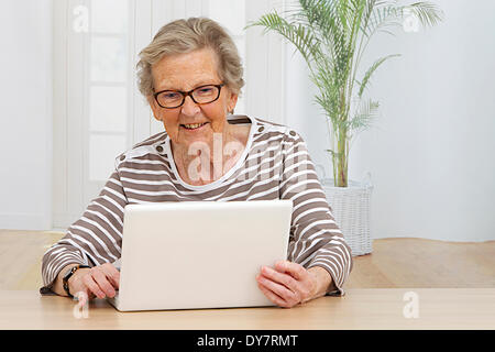 Elderly person, computer Stock Photo