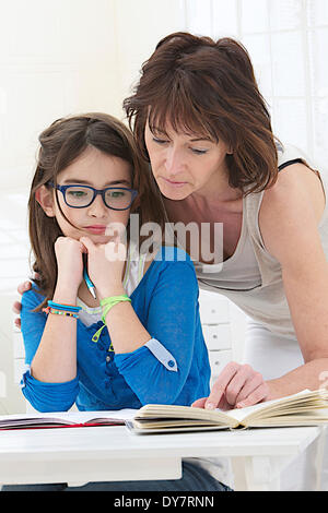 Child doing homework Stock Photo