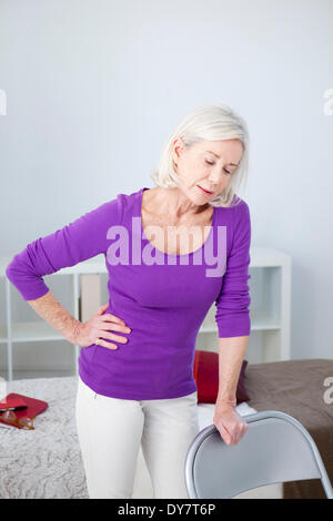 Hip pain in an elderly person Stock Photo
