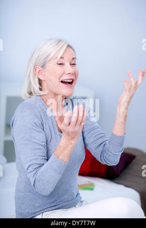 Elderly person indoors Stock Photo