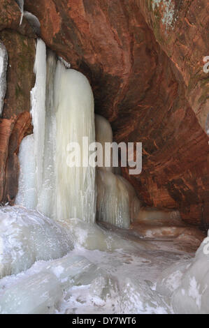 Frozen waterfall inside a cave on the shore of Lake Superior, Apostle Islands National Lakeshore, Bayfield, Wisconsin, USA Stock Photo