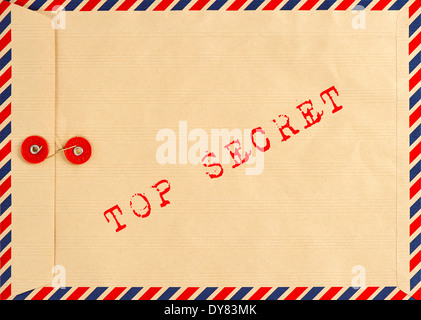 vintage airmail envelope. grungy background. text top secret Stock Photo