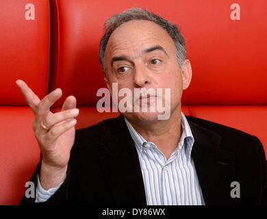 Stuttgart, Germany. 09th Apr, 2014. The former soccer European champion and international player Hansi Mueller speaks during a dpa-interview in Stuttgart, Germany, 09 April 2014. Mueller asked the German national players to prepare mentally for the World Cup in Brasil. Photo: Bernd Weissbrod/dpa/Alamy Live News Stock Photo