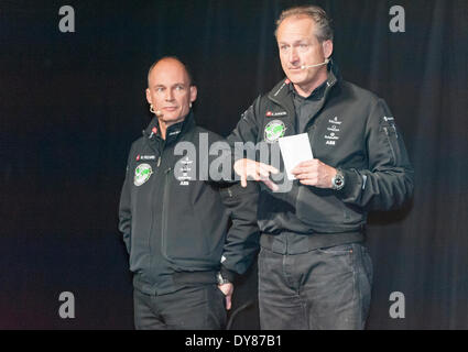 Payerne, Switzerland. 09th Apr, 2014. Bertrand Piccard (left) and Andre Borschberg at the unveiling of 'Solar Impulse 2', a spectacular solar powered aircraft made to fly around the world without any fuel. Credit:  Erik Tham/Alamy Live News Stock Photo