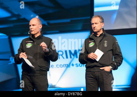Payerne, Switzerland. 09th Apr, 2014. Bertrand Piccard (left) and Andre Borschberg at the unveiling of 'Solar Impulse 2', a spectacular solar powered aircraft made to fly around the world without any fuel. Credit:  Erik Tham/Alamy Live News Stock Photo