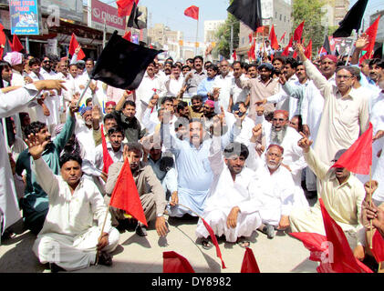 Members of Wapda Hydro Electric Central Labour Union chant slogans against privatization of Water and Power Development Authority (WAPDA) during protest demonstration in Sukkur on Wednesday, April 09, 2014. Stock Photo