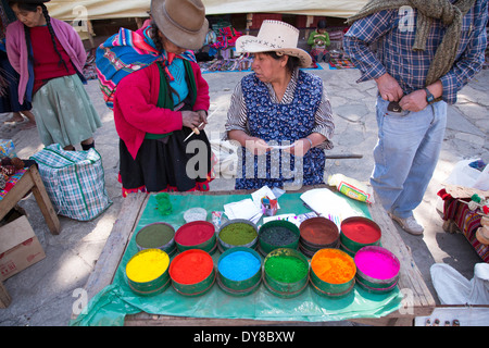 South America, Peru, Cuzco, Sacred Valley near Pisac, people and colored powder in market Stock Photo