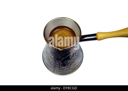 turkish coffee brewing pot isolated on white Stock Photo