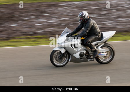 Super bike driving a lap of the Knockhill circuit in Fife, Scotland. Stock Photo