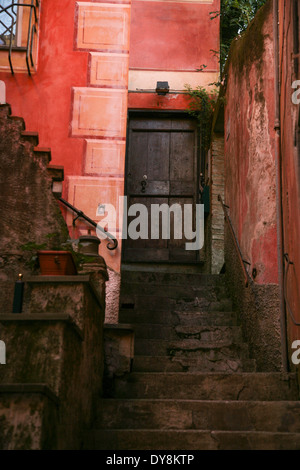 Narrow pathway with stairs coming into town from path in Cinque Terre Stock Photo