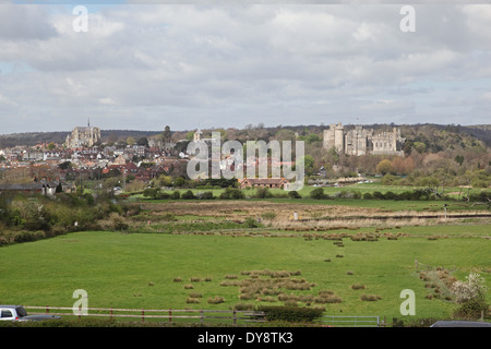 The historic English town of Arundel, West Sussex, viewed from the south east across the flood plain of the River Arun. Stock Photo