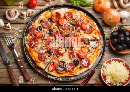 Top view of fresh baked pizza Stock Photo