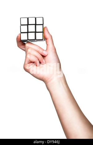Hand holding cube on white background Stock Photo
