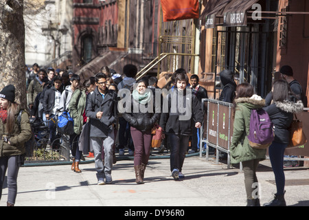 Students from Brooklyn Tech High School after school in the Fort Greene neighborhood of Brooklyn, NY. Stock Photo