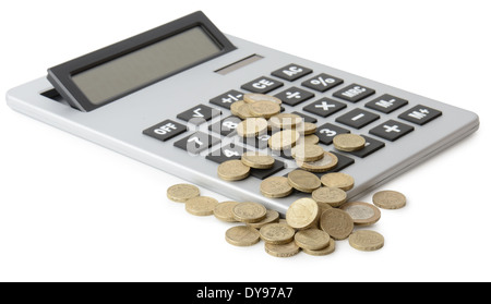 a pile of coins over a calculator isolated on a white background Stock Photo