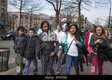School kids with their class on a neighborhood field trip in Windsor Terrace, Brooklyn, NY. Stock Photo