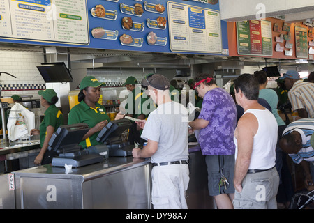 People being served inside the original Nathan's, famous for its hot dogs at Coney Island, Brooklyn, NY. Stock Photo