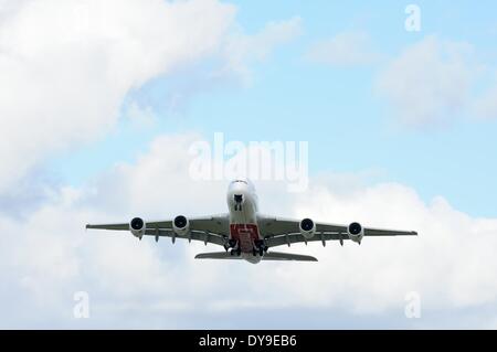 Glasgow, Scotland, UK. 10th April, 2014.  Airbus A380 takes off from Glasgow International Airport. Emirates Airlines celebrate 10 years of flights in and out of Glasgow by bringing the flagship A380 aircraft into Glasgow for the first time. Credit:  Douglas Carr/Alamy Live News Stock Photo